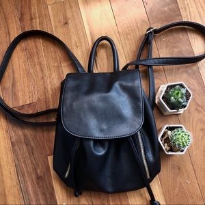 small black leather backpack